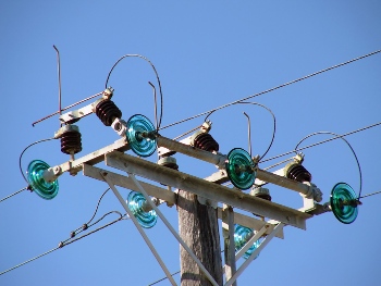 This photo of an electrical pole sporting colorful glass insulators was taken by photographer Craig Jewell of Brisbane, Australia.